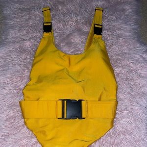 Yellow one piece bathing suit with buckles , can be used as a body suite w/jeans